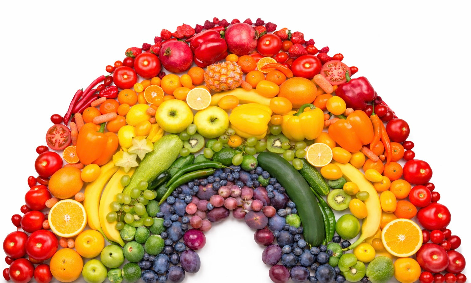 Different colors of fruits and vegetables lined up